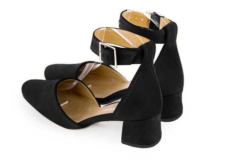 Matt black women's open side shoes, with a strap around the ankle. Round toe. Low flare heels. Rear view - Florence KOOIJMAN